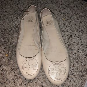 Tan slightly worn Tory Burch flats